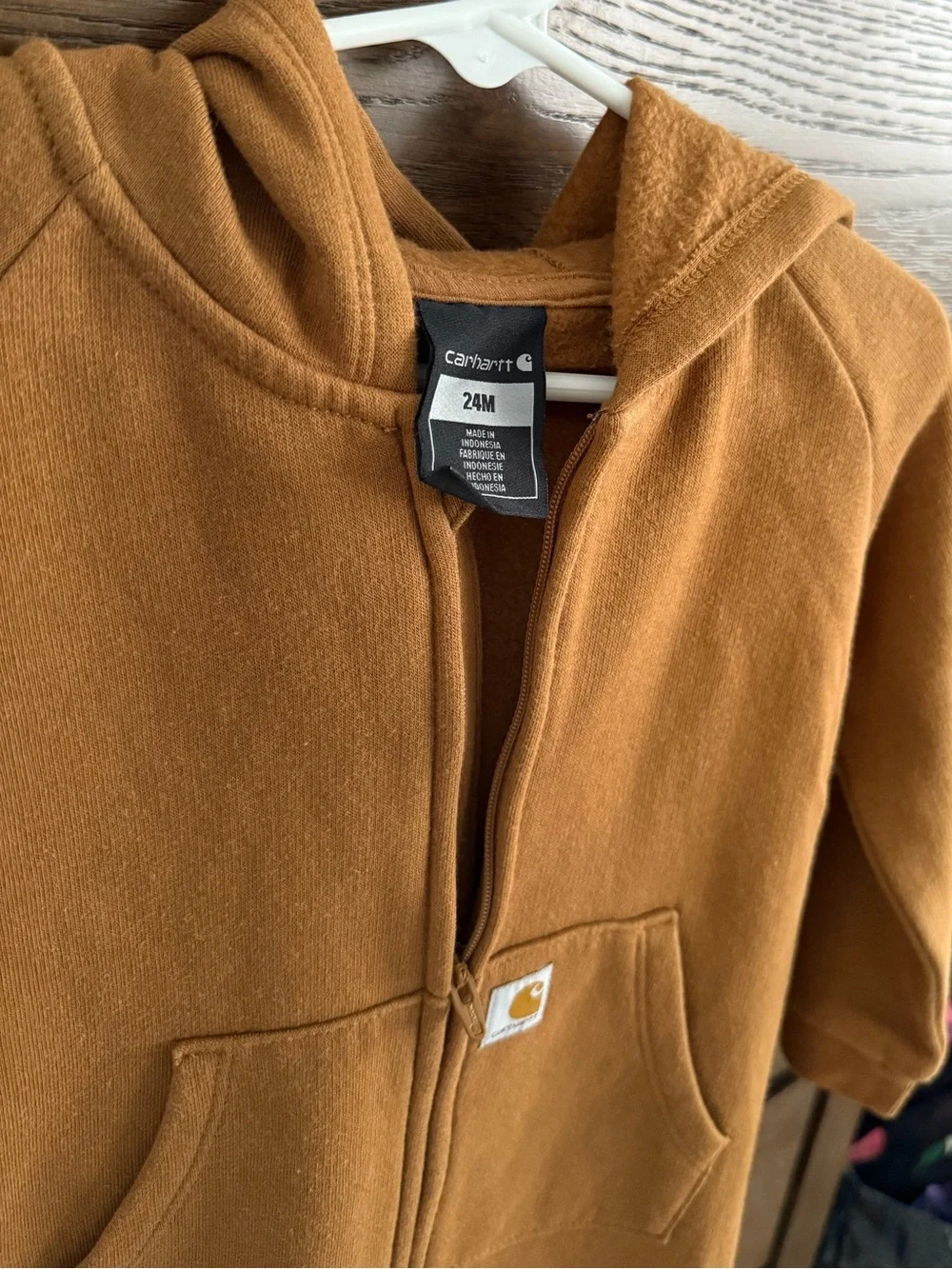 Two Carhartt Kids Hooded Zip One-Pieces in Carhartt Brown and dark navy